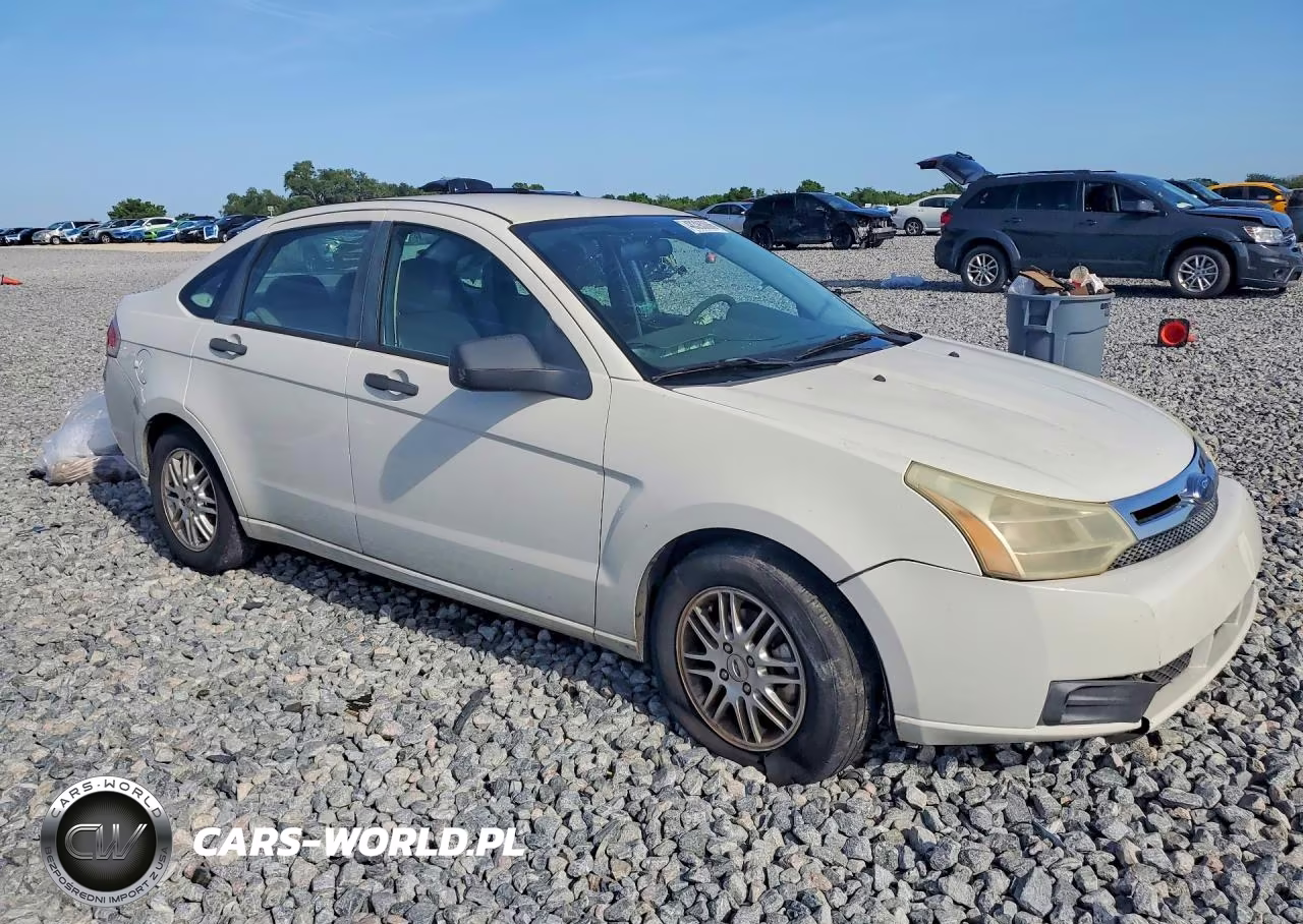 2009 Ford Focus VIN:1FAHP35N19W110012 - 4