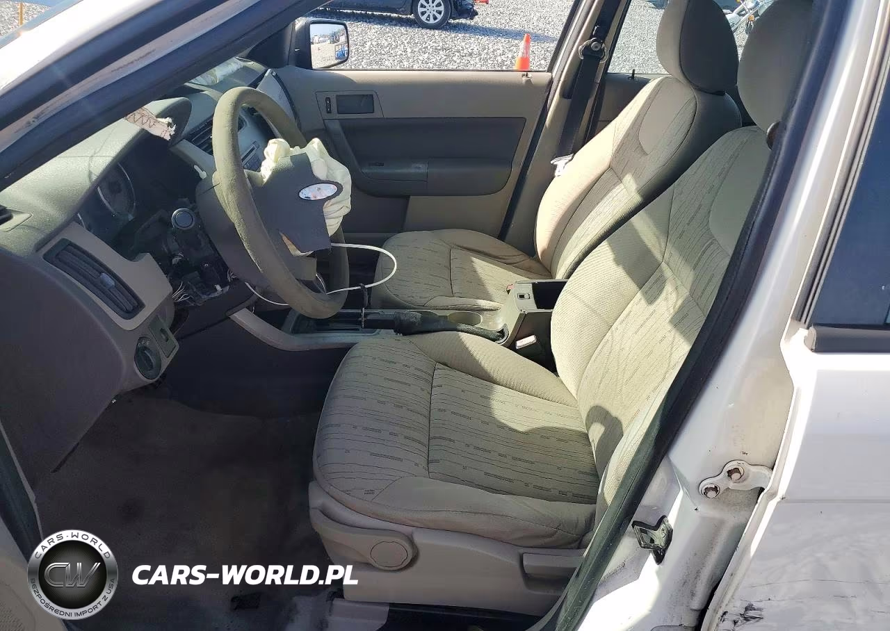 2009 Ford Focus VIN:1FAHP35N19W110012 - 7
