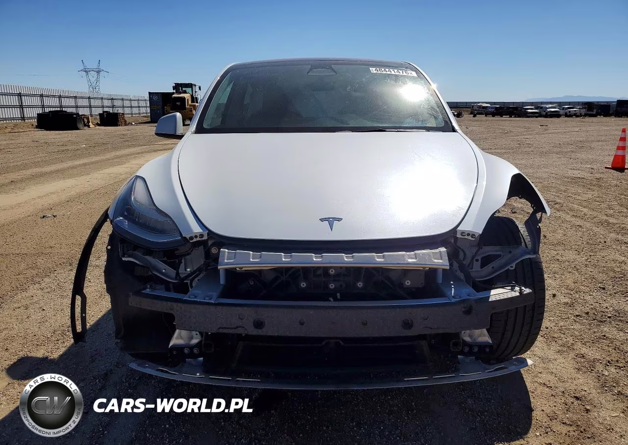 2023 Tesla Model Y VIN:7SAYGDEE7PA034748 - 5