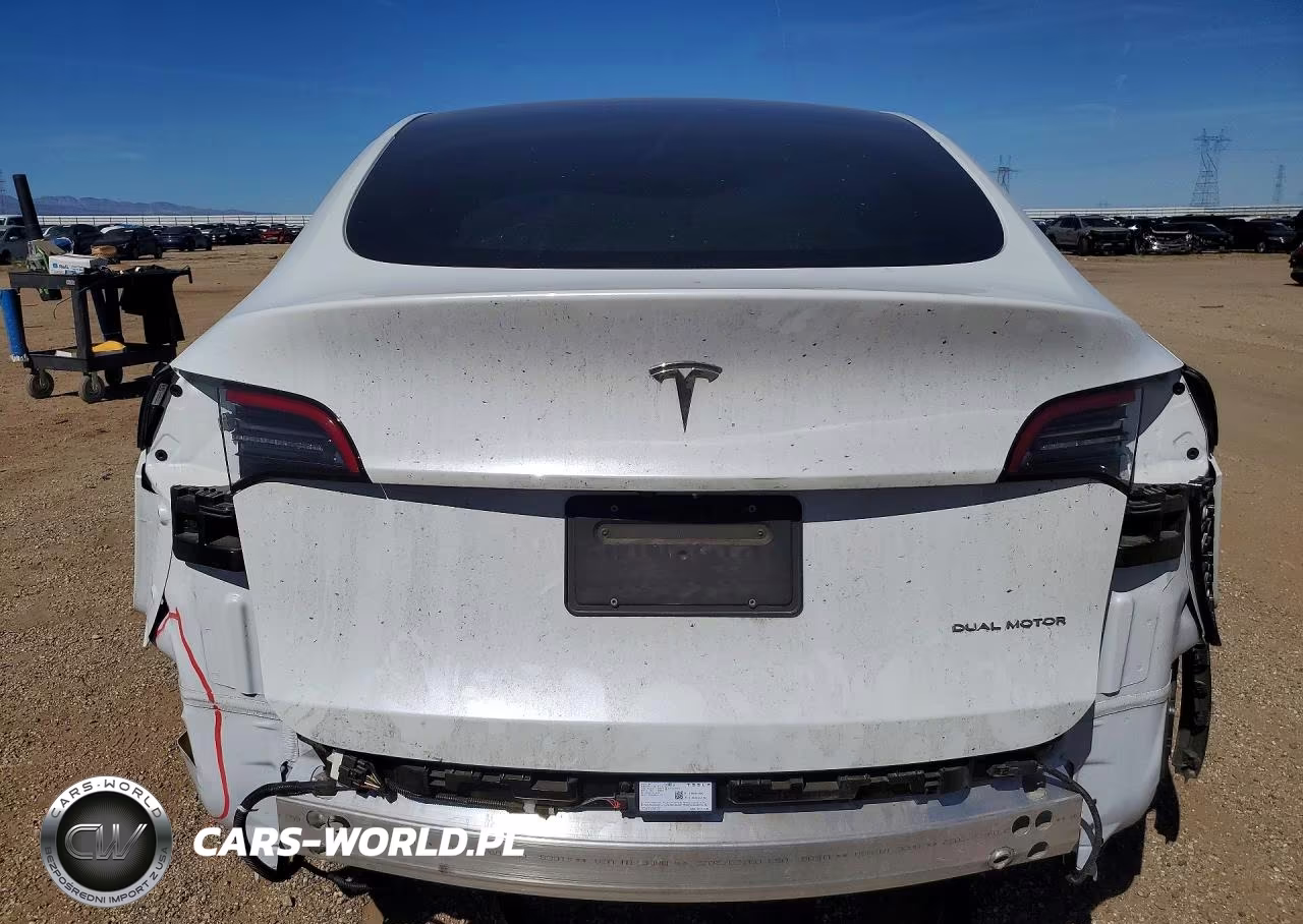 2023 Tesla Model Y VIN:7SAYGDEE7PA034748 - 6