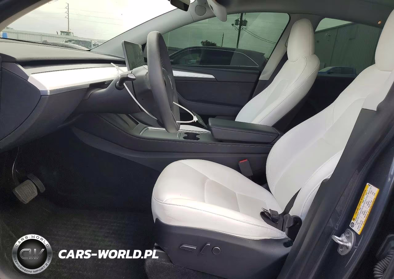 2023 Tesla Model Y VIN:7SAYGAEE0PF956960 - 7