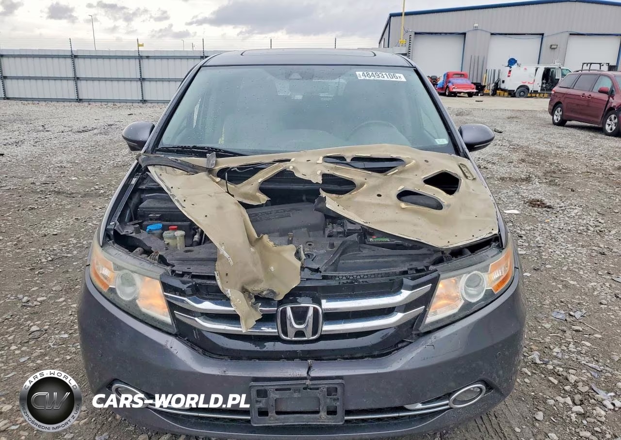 2014 Honda Odyssey Touring VIN:5FNRL5H99EB029584 - 5
