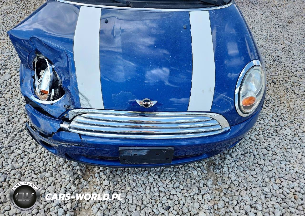 2009 Mini Cooper VIN:WMWMF33549TU70128 - 11