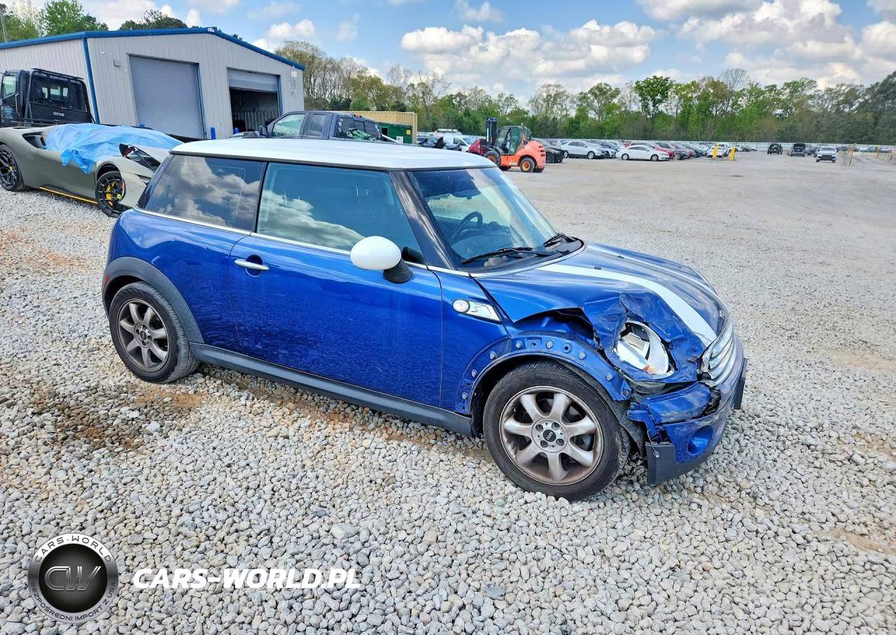 2009 Mini Cooper VIN:WMWMF33549TU70128 - 4