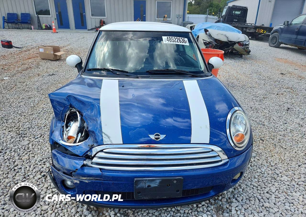 2009 Mini Cooper VIN:WMWMF33549TU70128 - 5