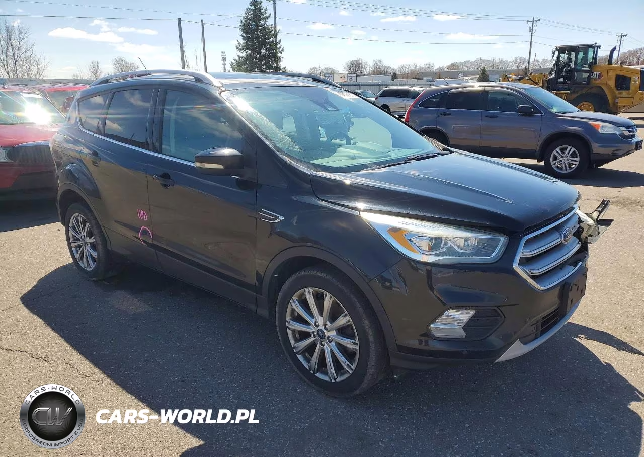 2017 Ford Escape Titanium VIN:1FMCU9J9XHUA61570 - 4