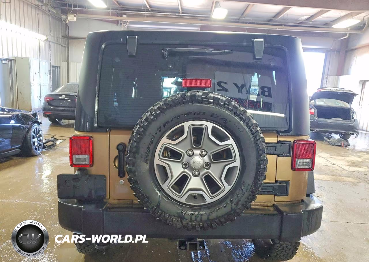 2015 Jeep Wrangler Unlimited Rubicon VIN:1C4HJWFG2FL675220 - 6