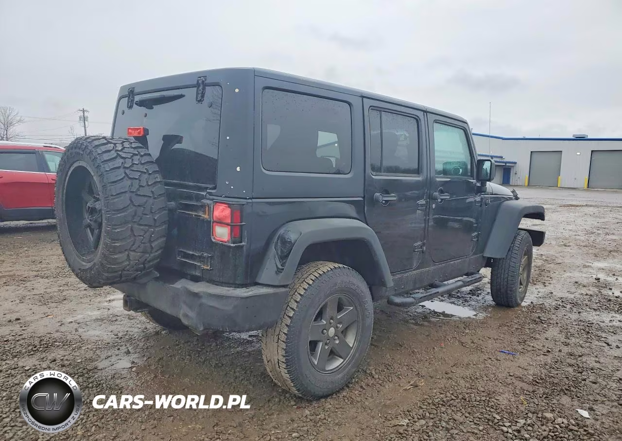 2011 Jeep Wrangler Unlimited Rubicon VIN:1J4BA6H14BL565420 - 3