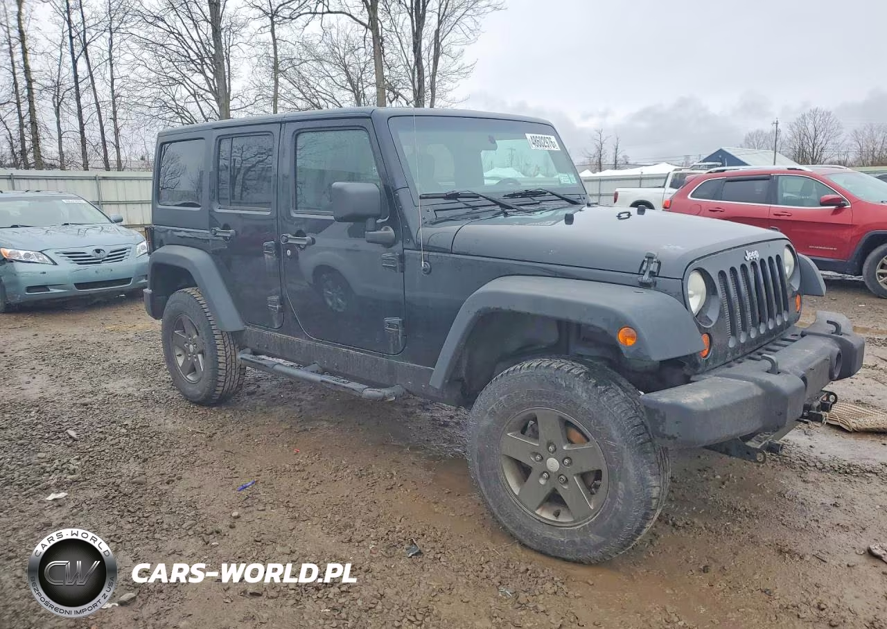 2011 Jeep Wrangler Unlimited Rubicon VIN:1J4BA6H14BL565420 - 4