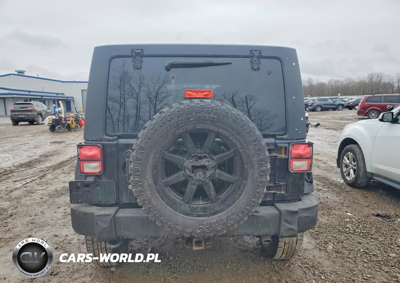 2011 Jeep Wrangler Unlimited Rubicon VIN:1J4BA6H14BL565420 - 6