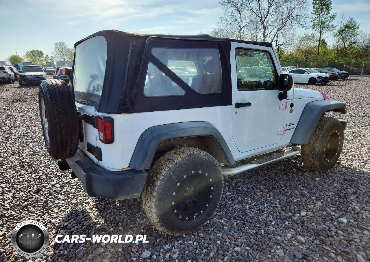 2011 Jeep Wrangler Sport VIN:1J4AA2D17BL619576 - 3