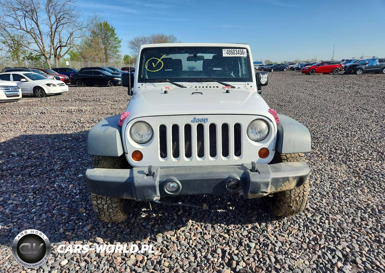 2011 Jeep Wrangler Sport VIN:1J4AA2D17BL619576 - 5