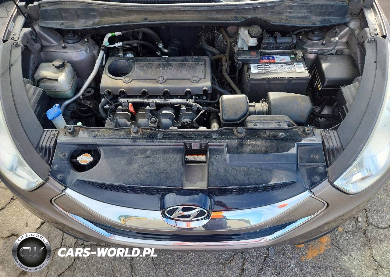 2012 Hyundai Tucson VIN:KM8JU3AC7CU486561 - 12