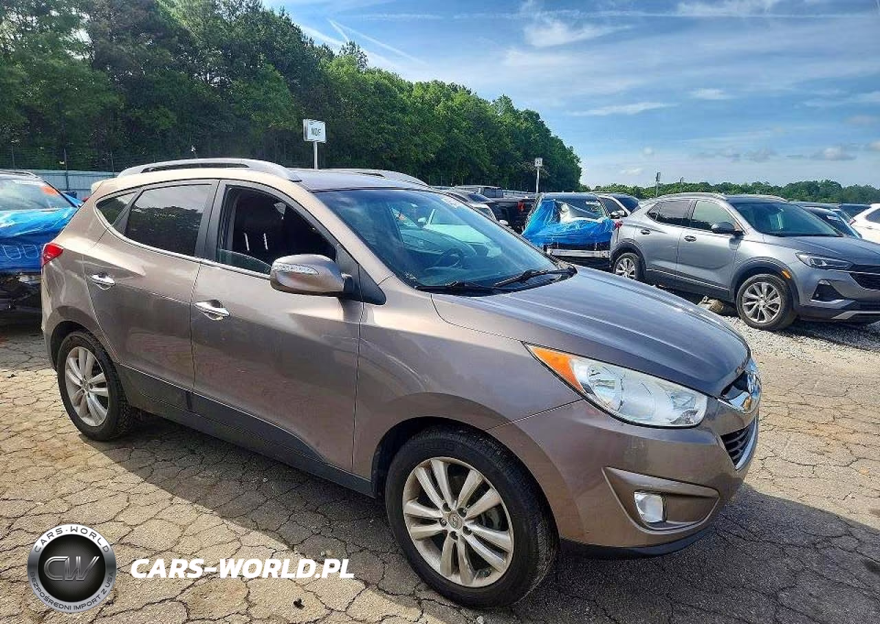 2012 Hyundai Tucson VIN:KM8JU3AC7CU486561 - 4