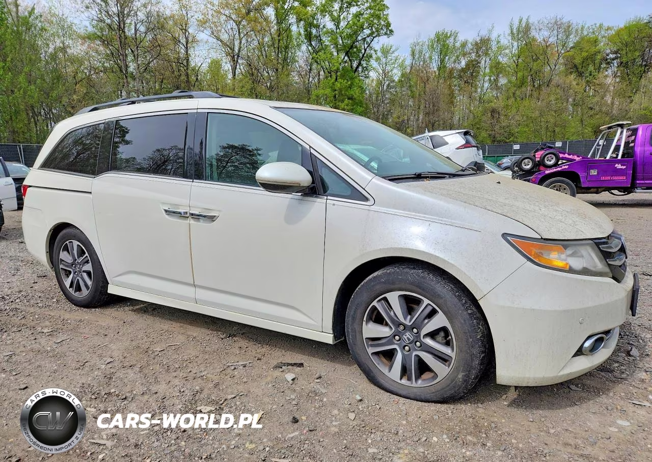 2014 Honda Odyssey Touring VIN:5FNRL5H90EB001463 - 4