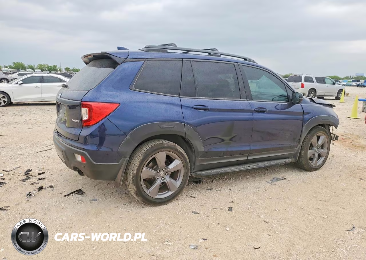 2019 Honda Passport Touring VIN:5FNYF7H95KB000125 - 3