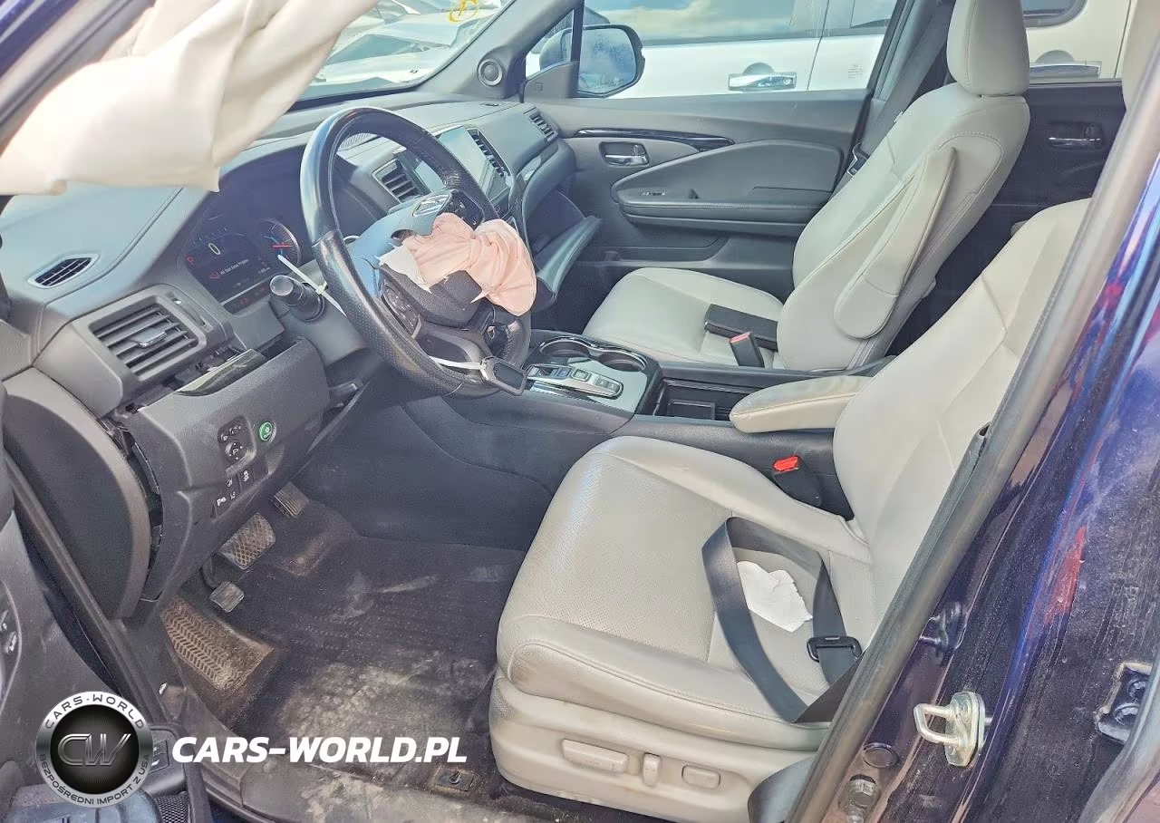 2019 Honda Passport Touring VIN:5FNYF7H95KB000125 - 7