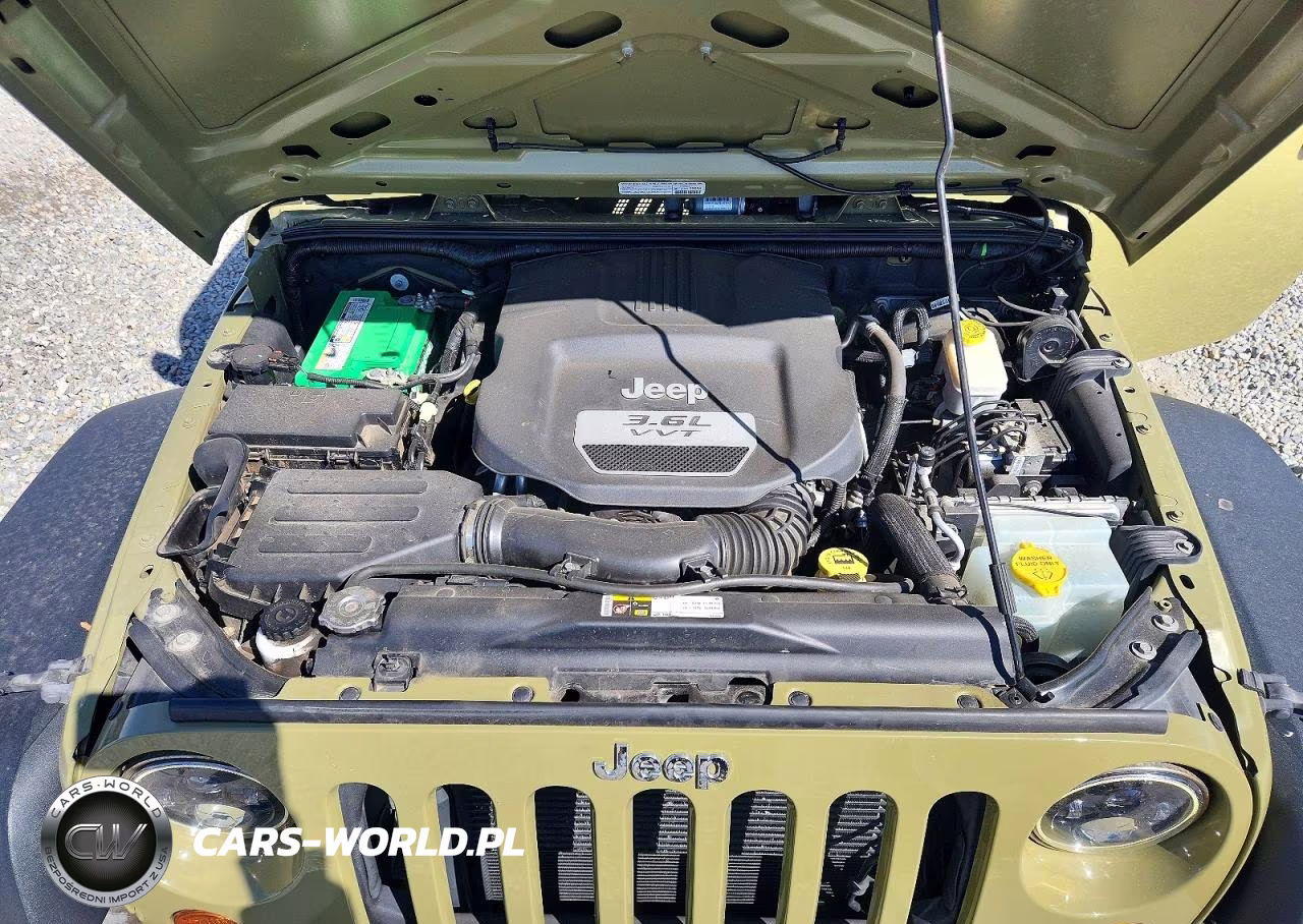 2013 Jeep Wrangler Unlimited Sport VIN:1C4BJWDG0DL605740 - 12