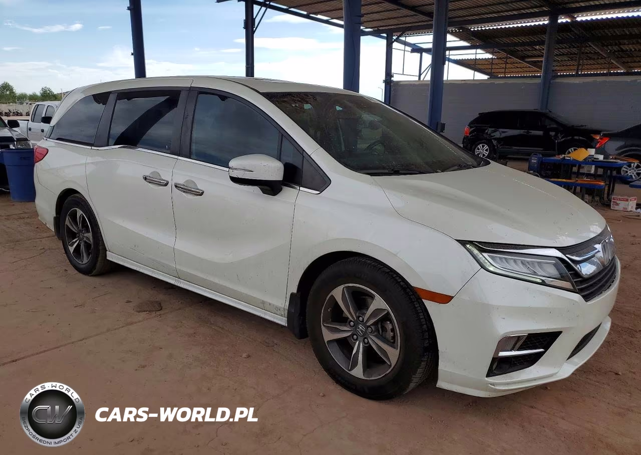 2019 Honda Odyssey Touring VIN:5FNRL6H86KB081862 - 4