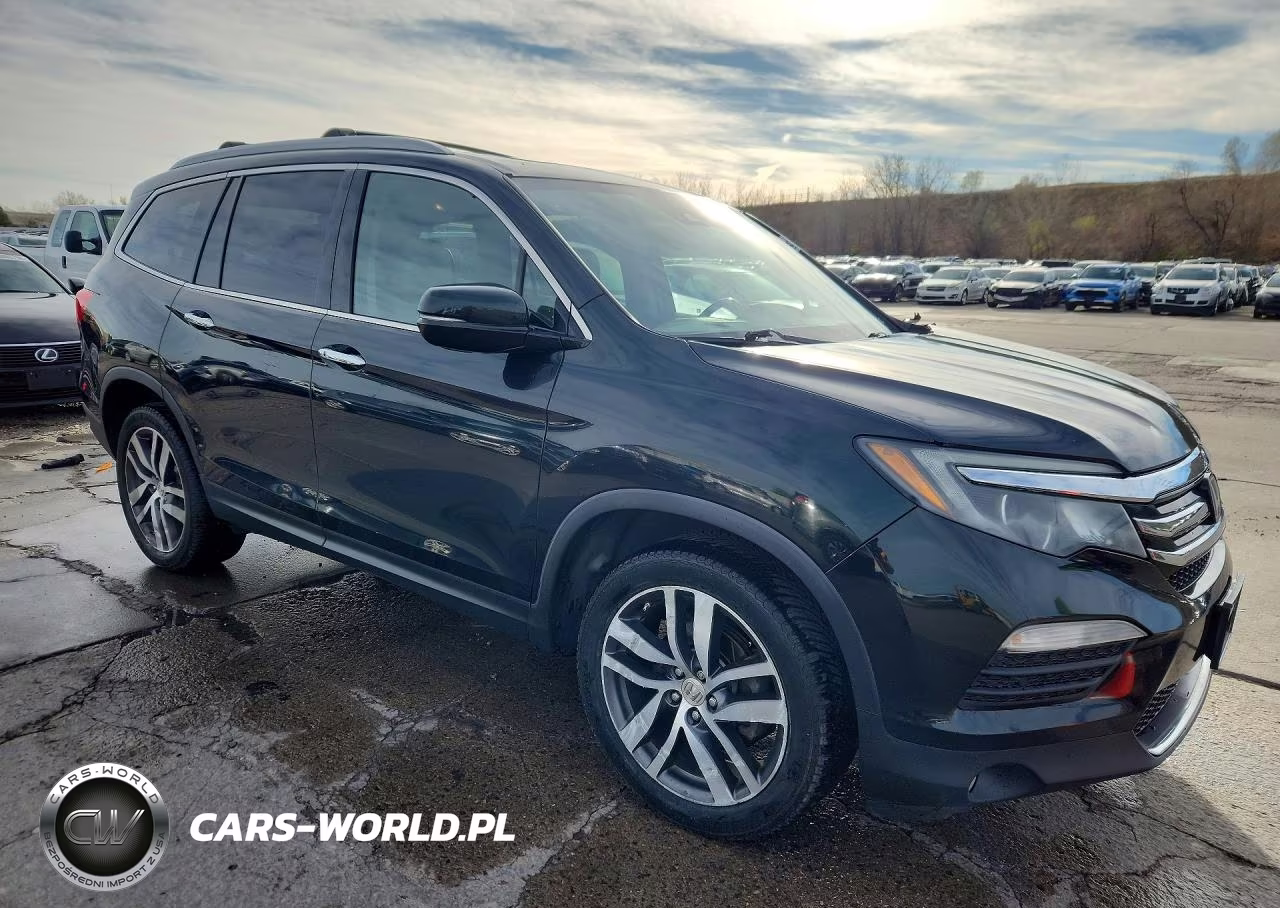 2016 Honda Pilot Elite VIN:5FNYF6H06GB125721 - 4