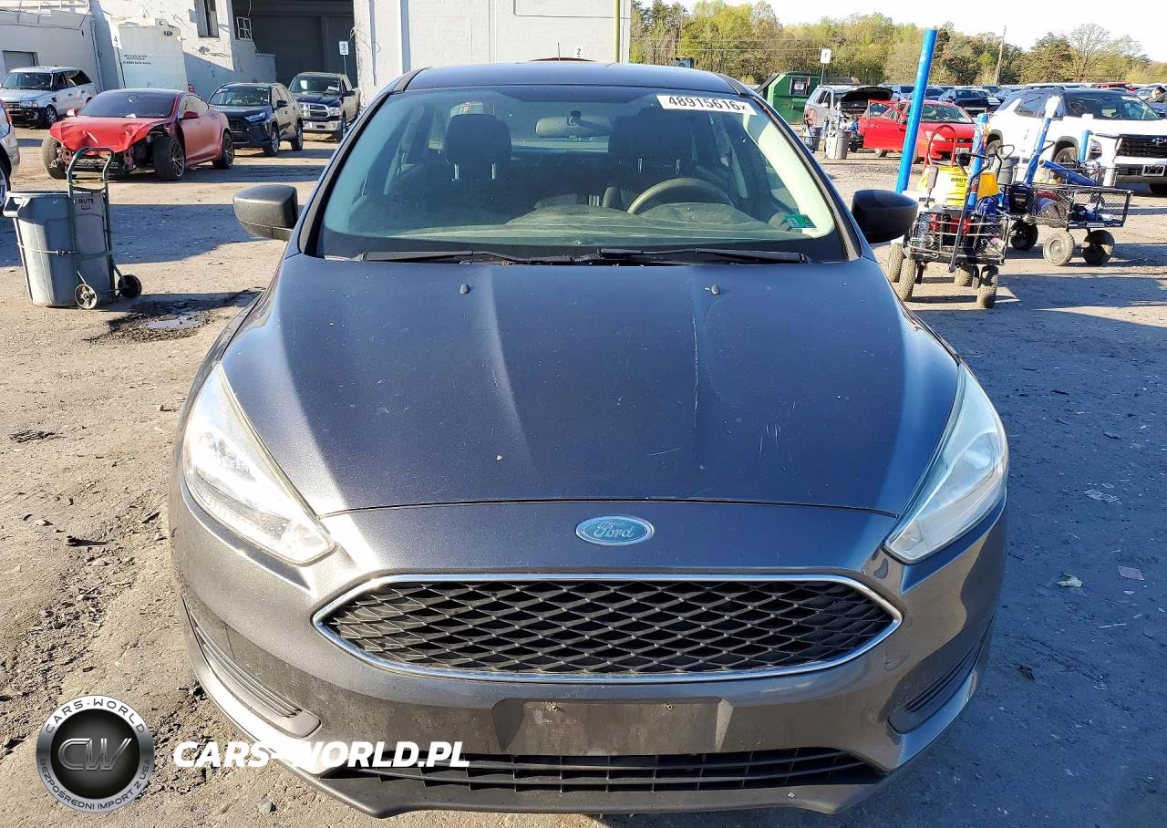 2017 Ford Focus S VIN:1FADP3E22HL316153 - 5