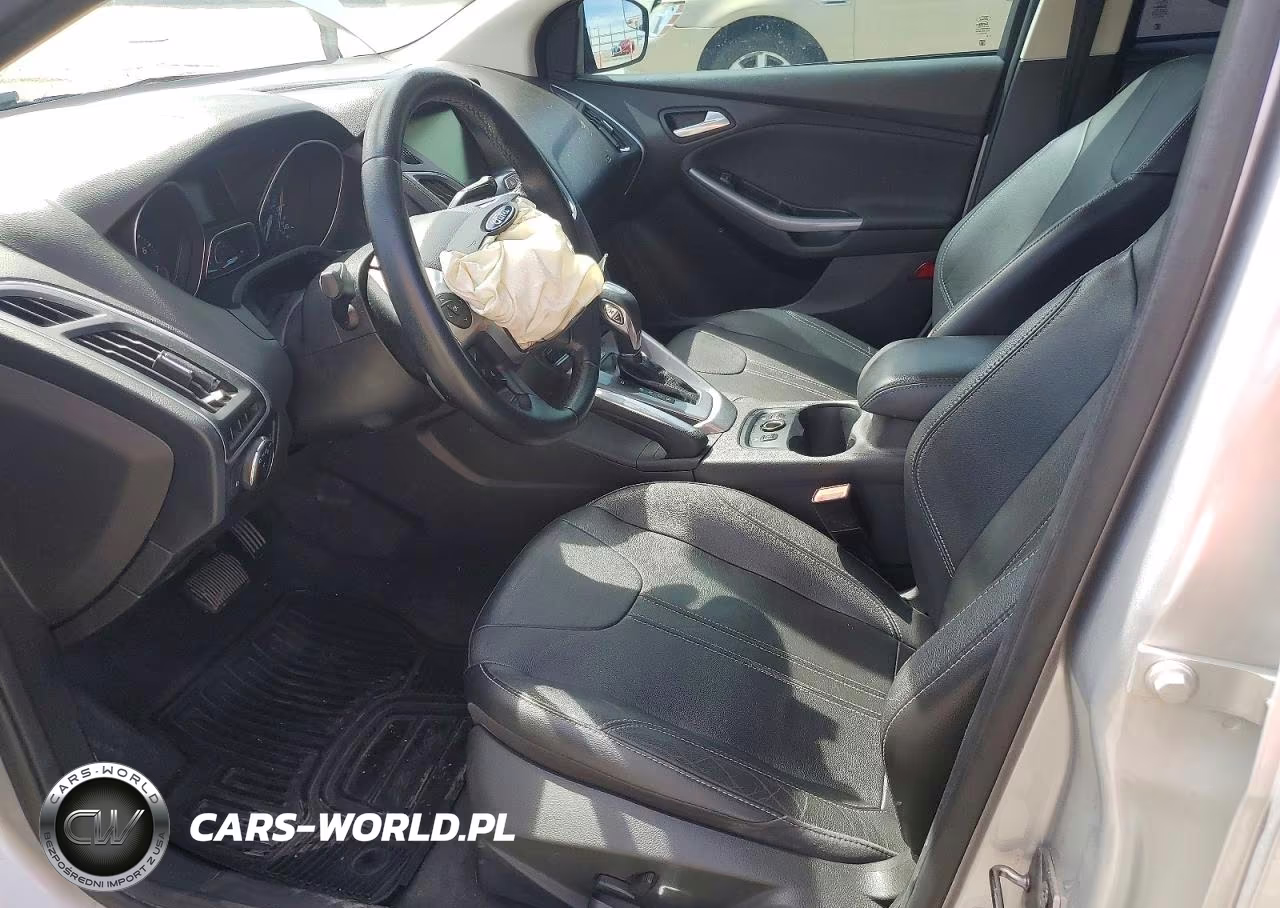 2012 Ford Focus Titanium VIN:1FAHP3N20CL236084 - 7
