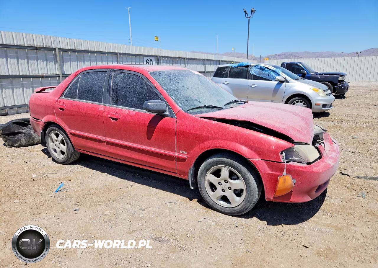 2000 Mazda Protege Es VIN:JM1BJ2237Y0259301 - 4