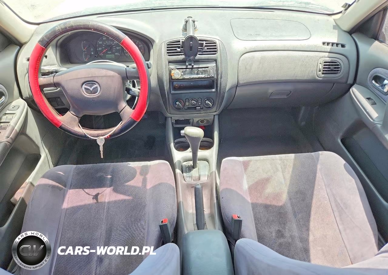 2000 Mazda Protege Es VIN:JM1BJ2237Y0259301 - 8