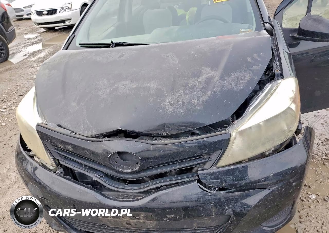 2012 Toyota Yaris VIN:JTDKTUD3XCD537015 - 11
