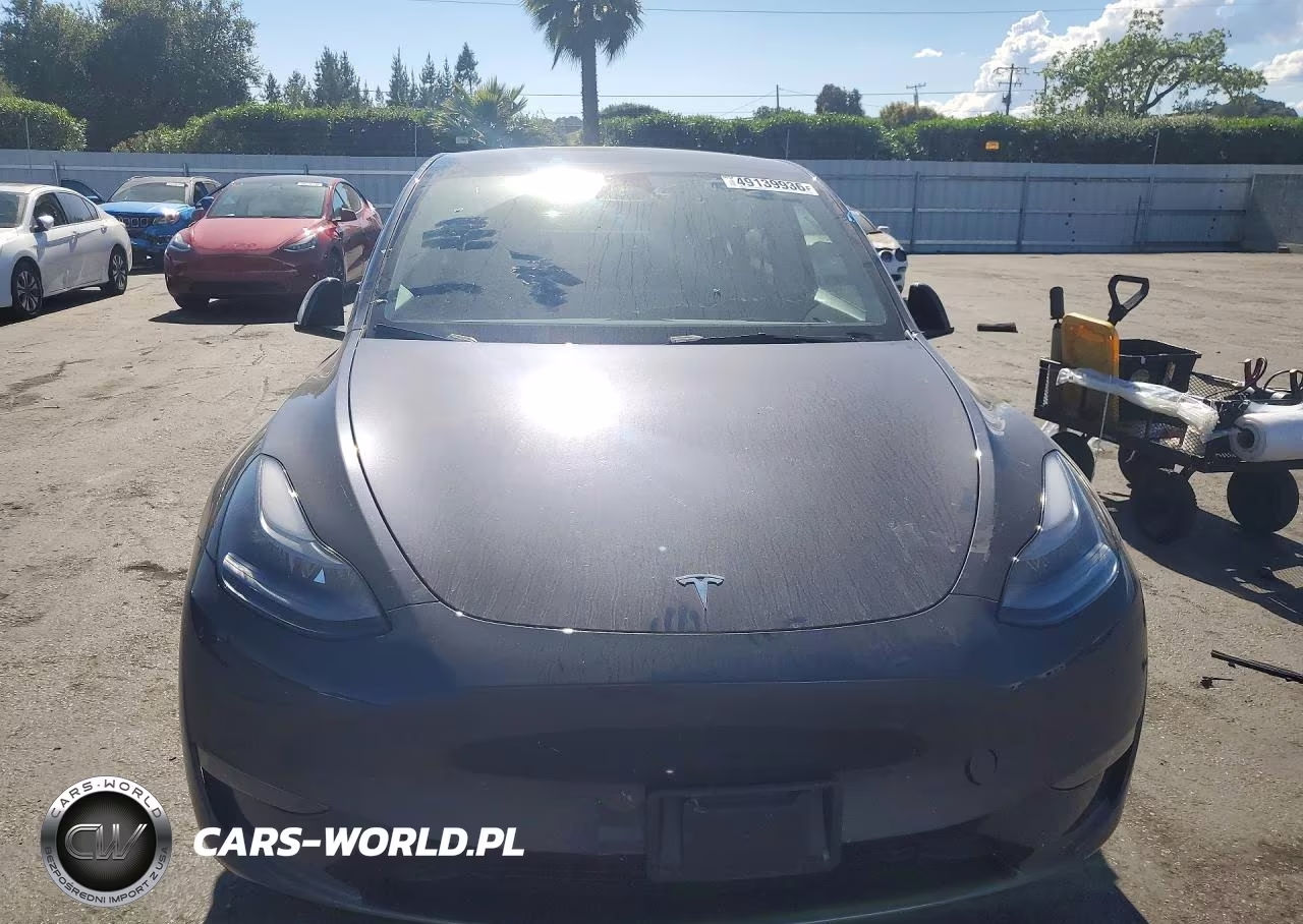 2024 Tesla Model Y VIN:7SAYGDEF2RA267898 - 5