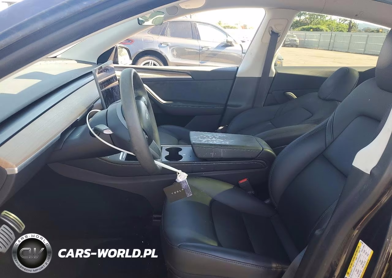 2024 Tesla Model Y VIN:7SAYGDEF2RA267898 - 7