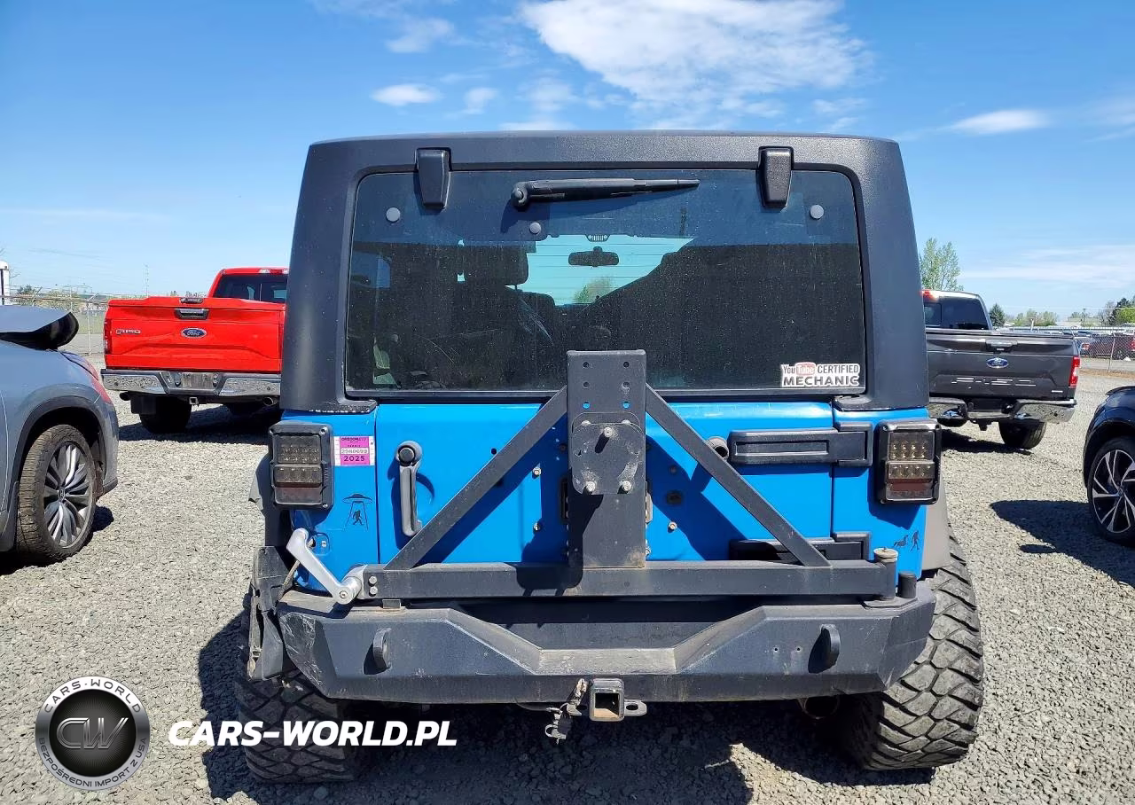 2011 Jeep Wrangler Sport VIN:1J4AA2D17BL552851 - 6