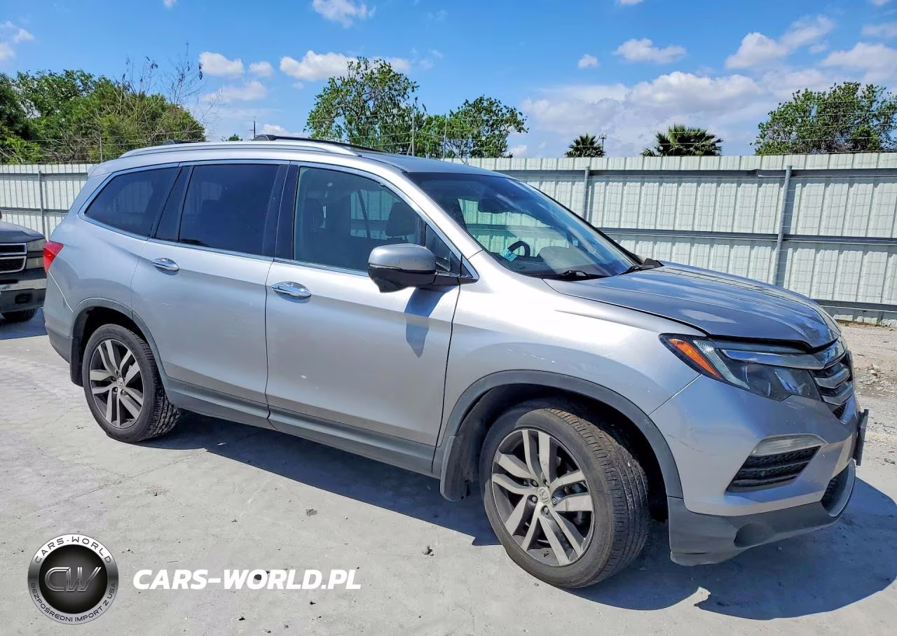 2017 Honda Pilot Touring VIN:5FNYF6H99HB076692 - 4