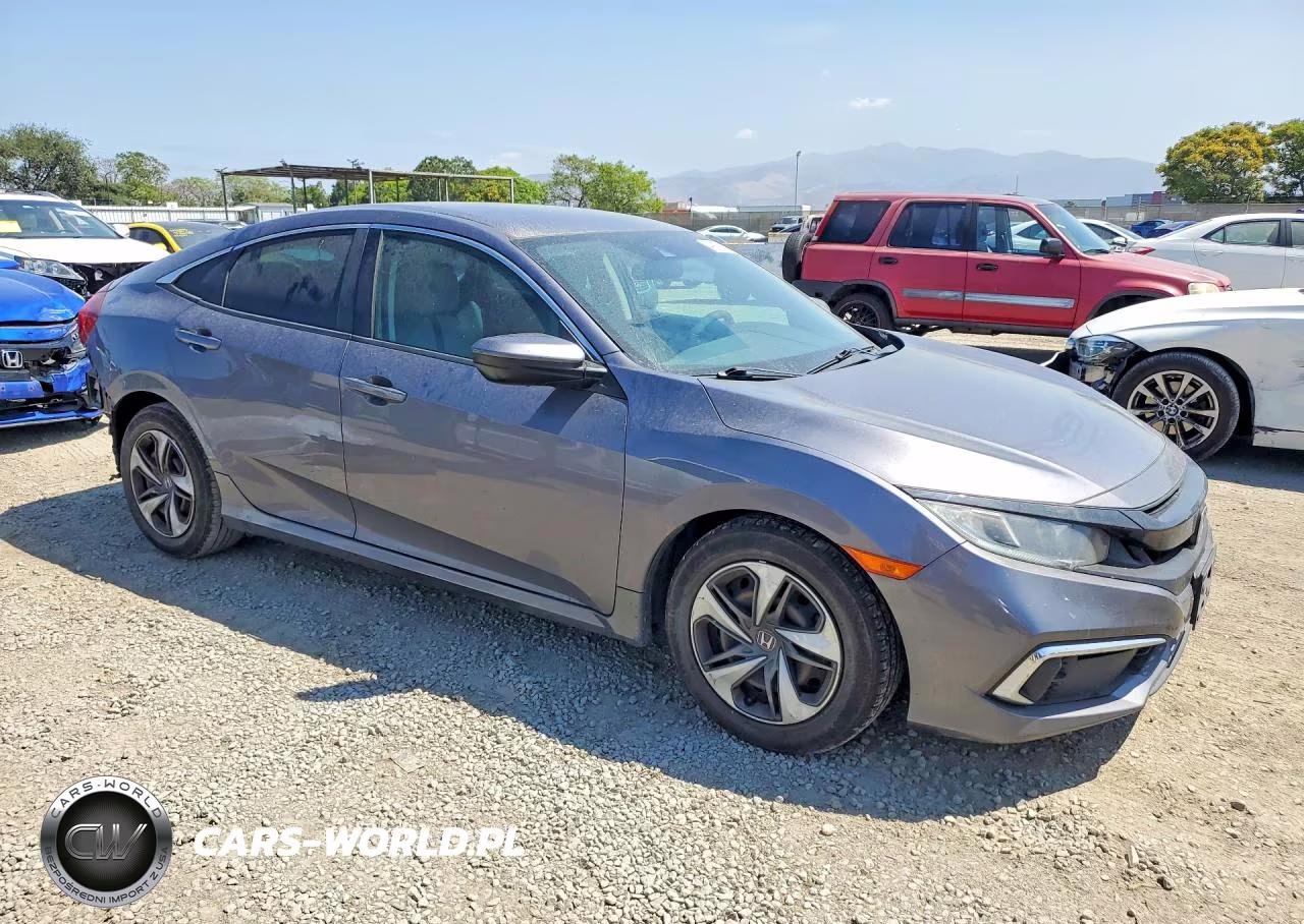 2019 Honda Civic Lx VIN:19XFC2F6XKE212357 - 4