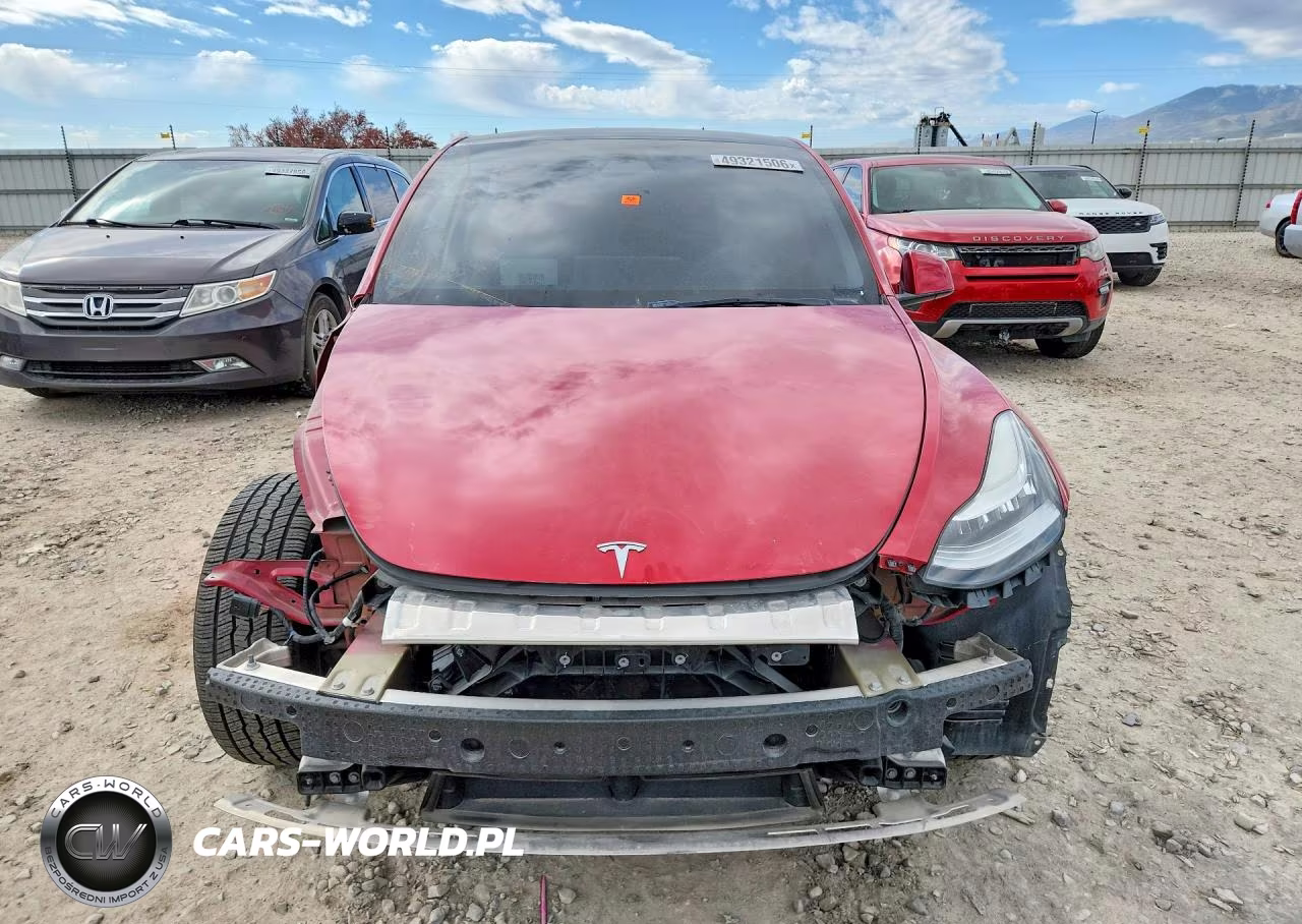 2023 Tesla Model Y VIN:7SAYGAEEXPF587475 - 5