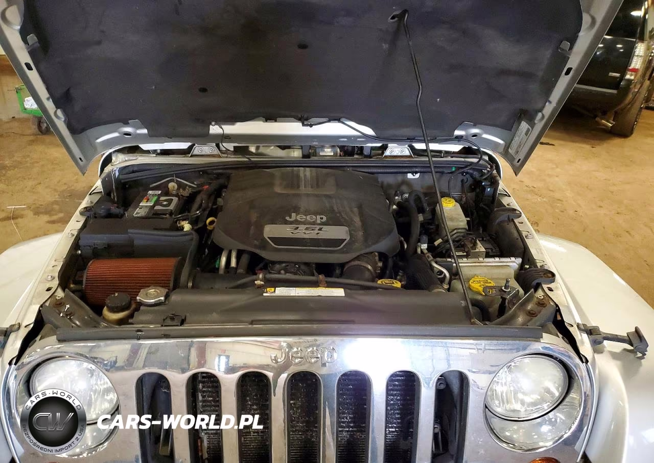 2012 Jeep Wrangler Unlimited Sahara VIN:1C4HJWEG6CL103709 - 12