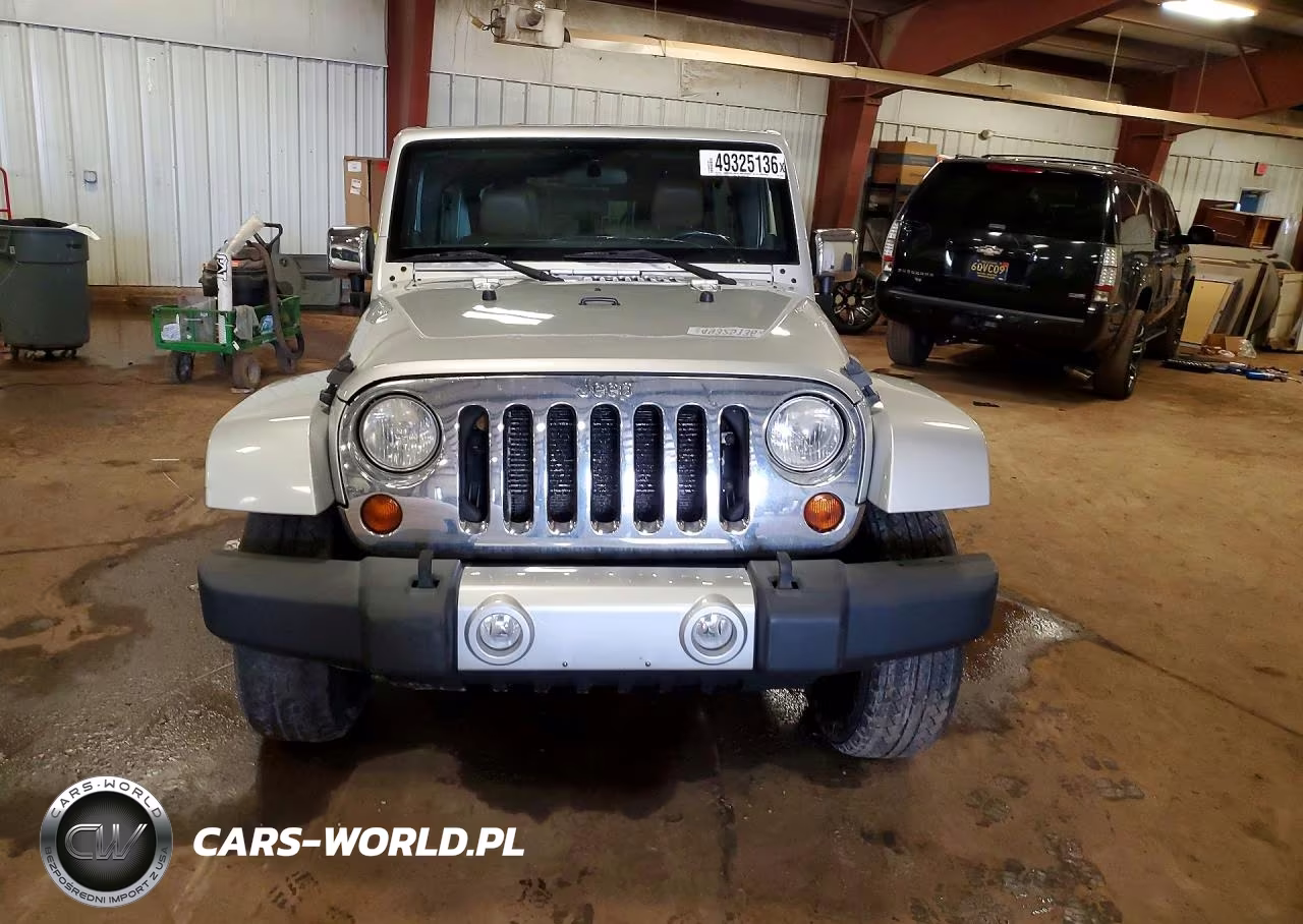 2012 Jeep Wrangler Unlimited Sahara VIN:1C4HJWEG6CL103709 - 5