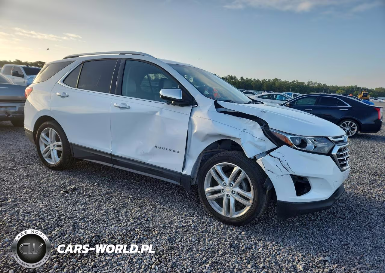 2018 Chevrolet Equinox Premier VIN:2GNAXMEV7J6112032 - 4
