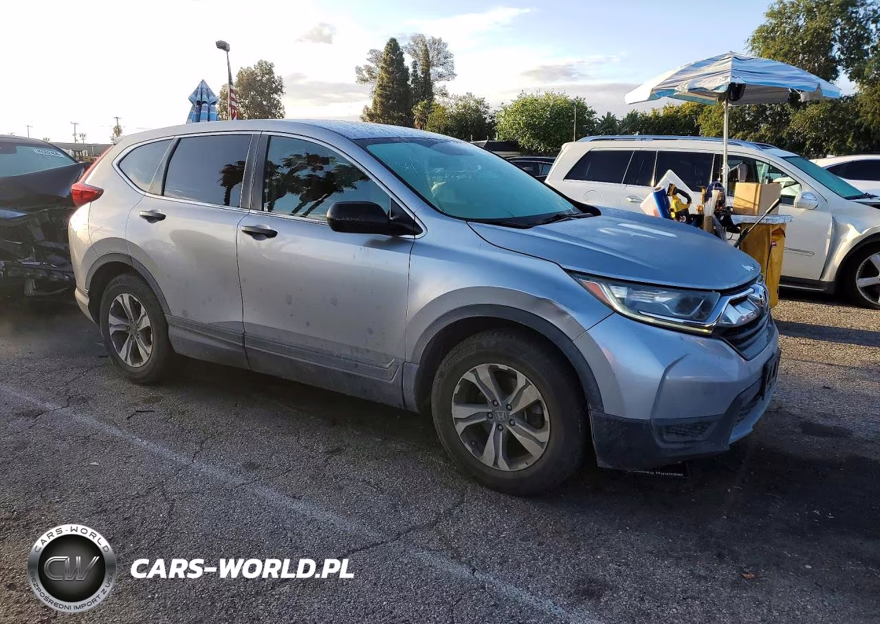 2018 Honda Cr-V Lx VIN:2HKRW5H38JH415444 - 4