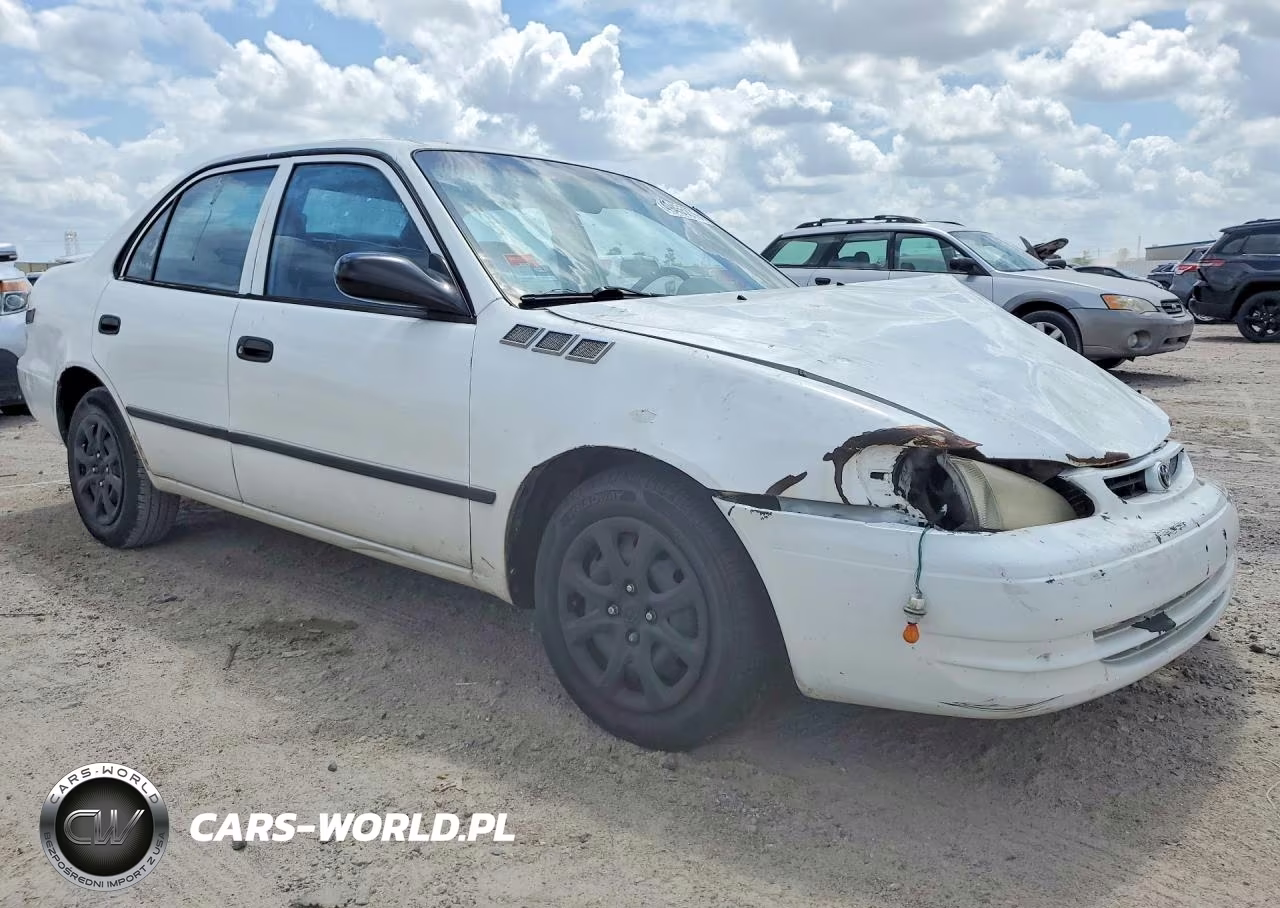 2000 Toyota Cor VIN:1NXBR12E0YZ330640 - 4