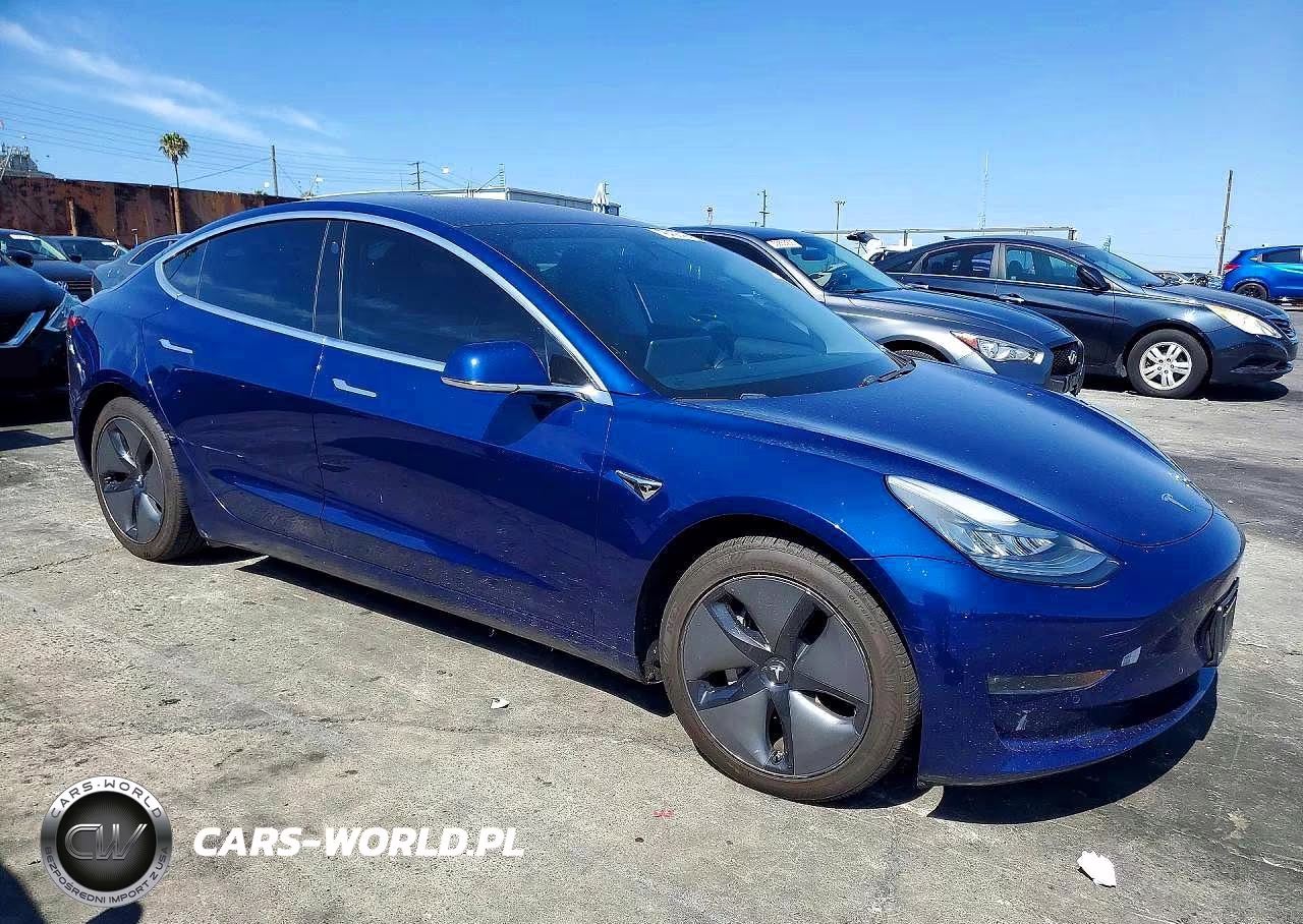 2018 Tesla Model 3 VIN:5YJ3E1EB2JF120402 - 4