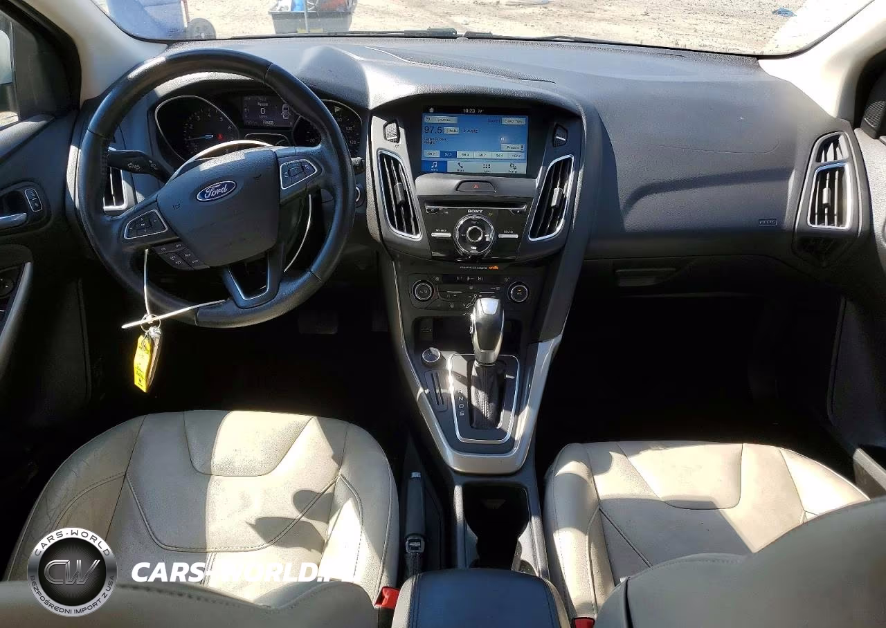 2016 Ford Focus Titanium VIN:1FADP3N2XGL332681 - 8