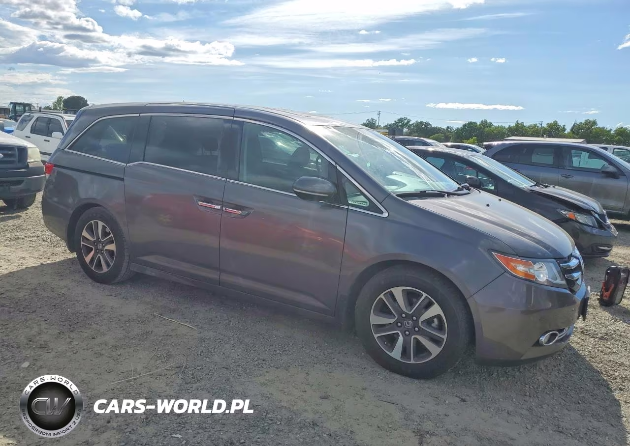 2014 Honda Odyssey Touring VIN:5FNRL5H96EB013990 - 4
