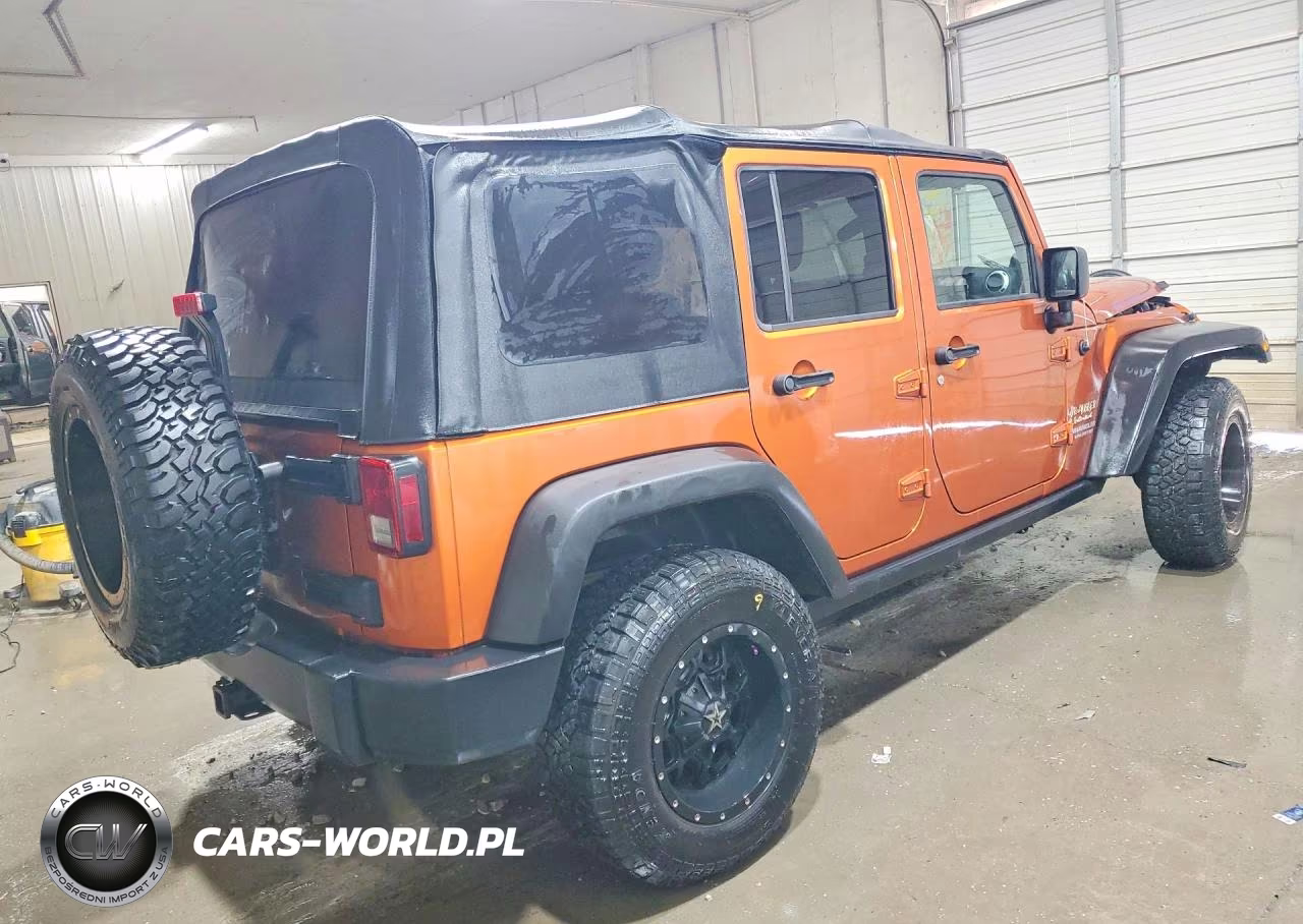 2011 Jeep Wrangler Unlimited Rubicon VIN:1J4BA6H1XBL520174 - 3