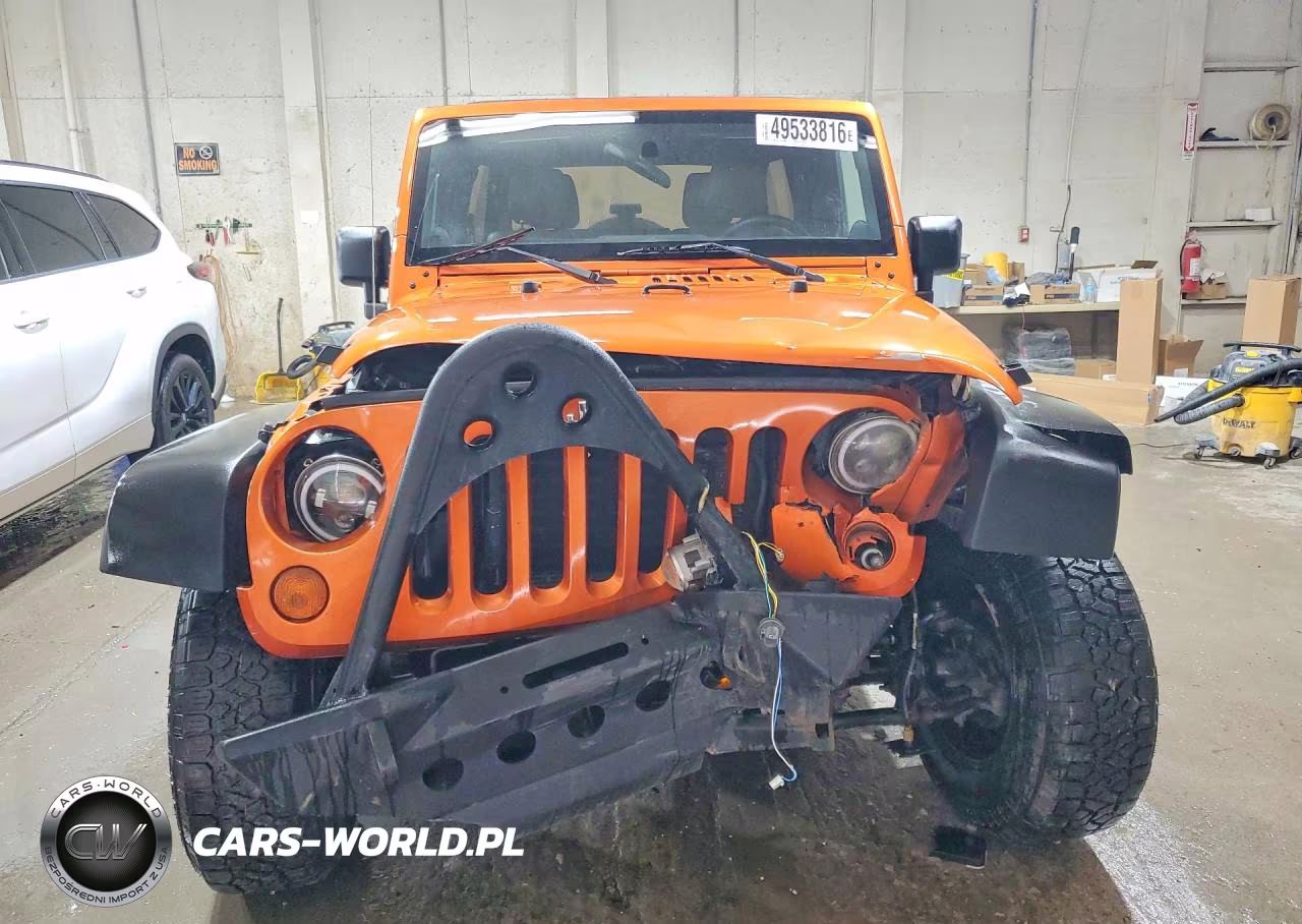 2011 Jeep Wrangler Unlimited Rubicon VIN:1J4BA6H1XBL520174 - 5
