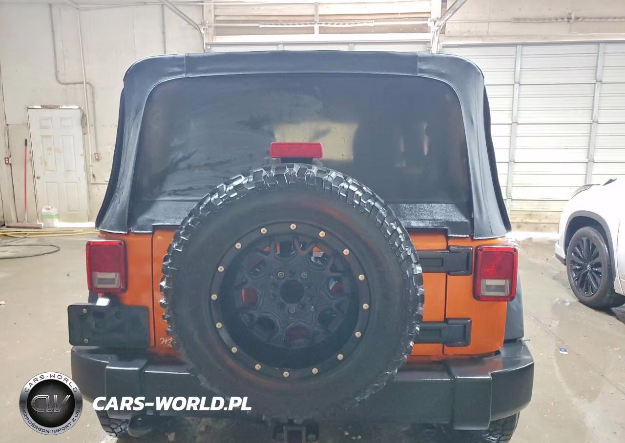 2011 Jeep Wrangler Unlimited Rubicon VIN:1J4BA6H1XBL520174 - 6