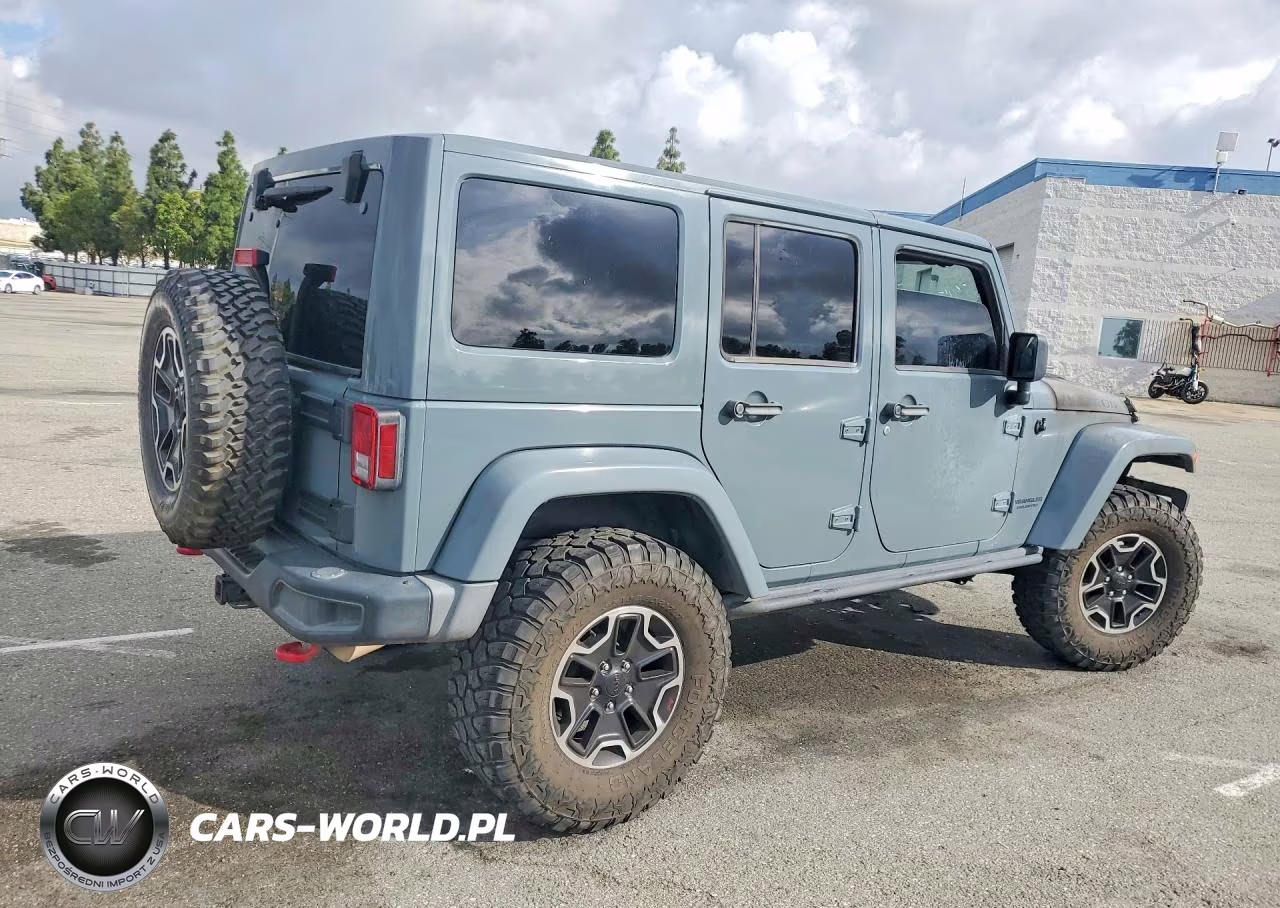 2014 Jeep Wrangler Unlimited Rubicon VIN:1C4HJWFG7EL173978 - 3