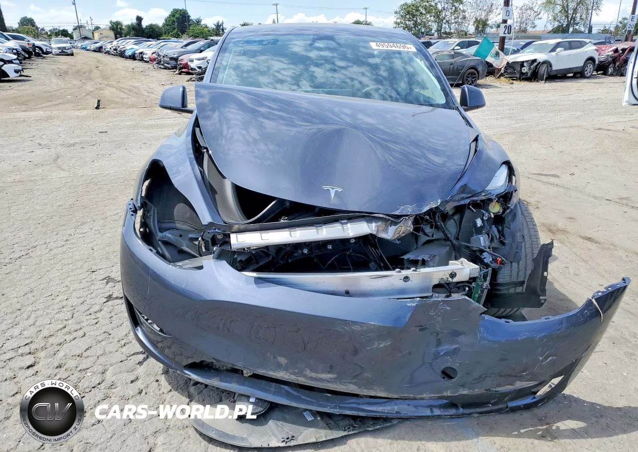 2024 Tesla Model Y VIN:7SAYGDEE0RA217220 - 5