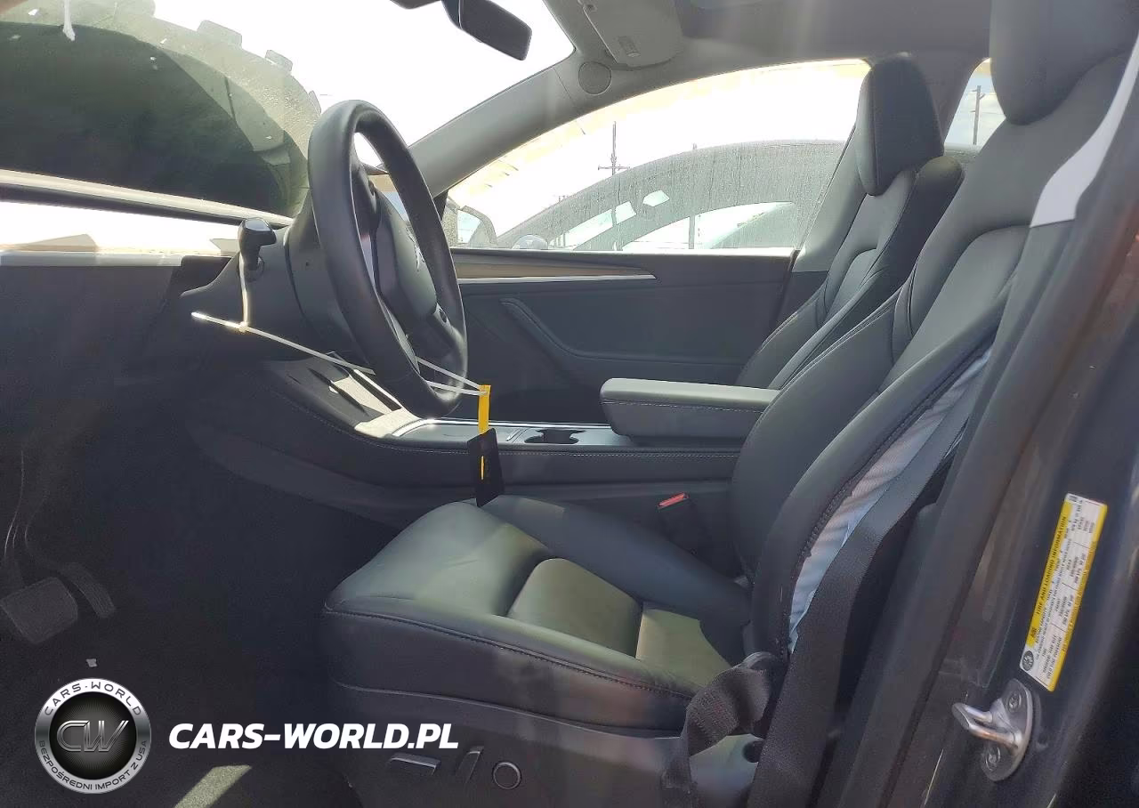 2024 Tesla Model Y VIN:7SAYGDEE0RA217220 - 7
