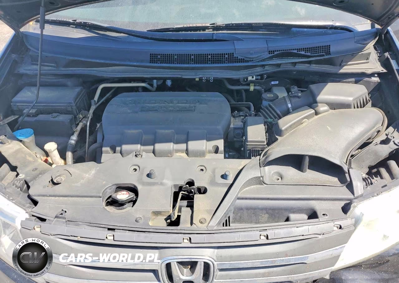 2012 Honda Odyssey Exl VIN:5FNRL5H67CB099975 - 12